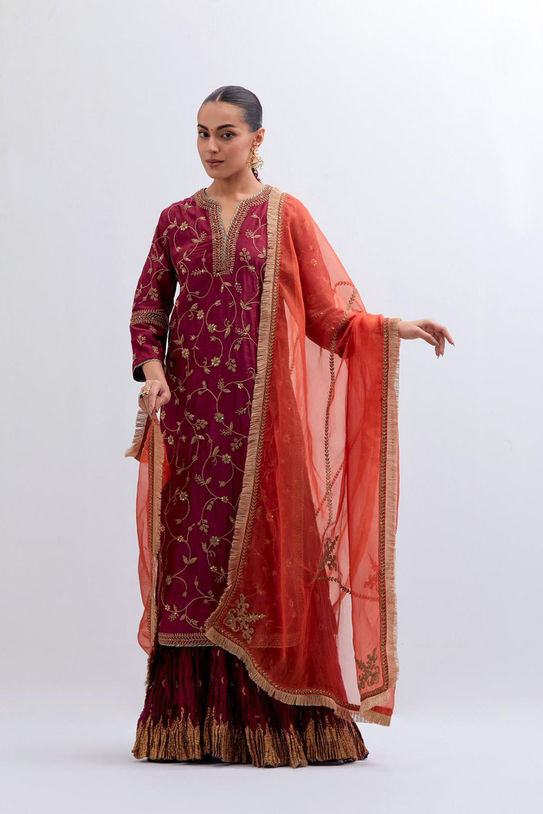 Red Silk chanderi straight kurta set with all-over dull gold dori jaal embroidery, highlighted with gold sequins and bead work.