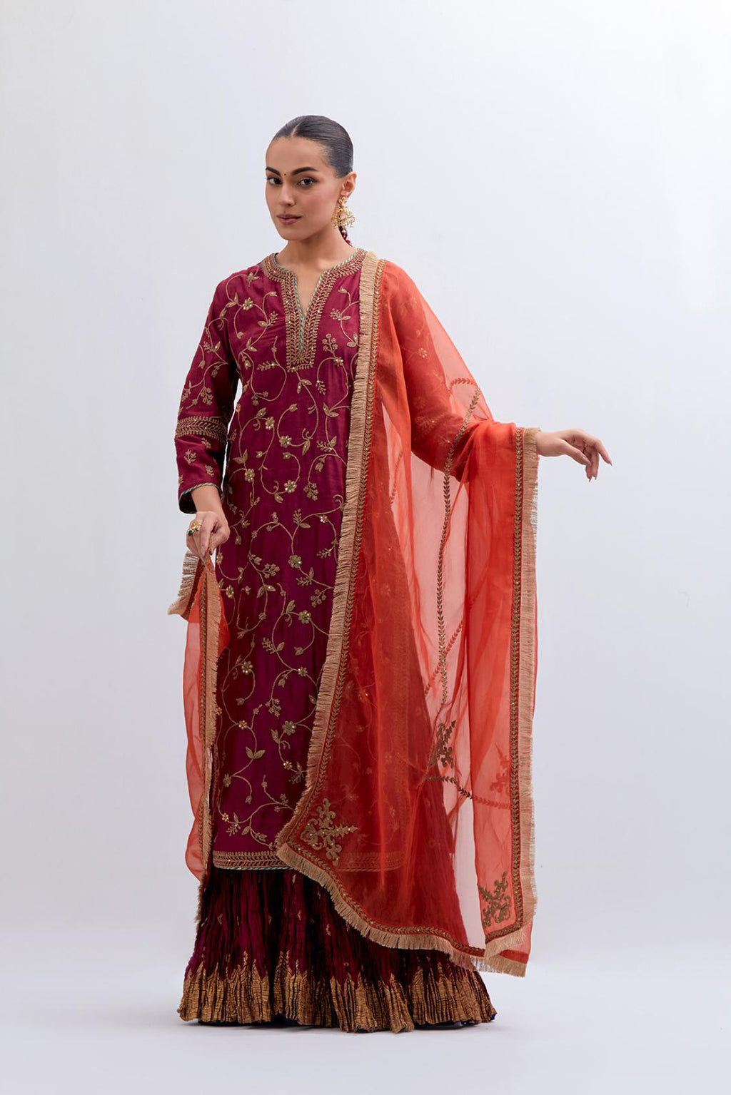 Red Silk chanderi straight kurta set with all-over dull gold dori jaal embroidery, highlighted with gold sequins and bead work.