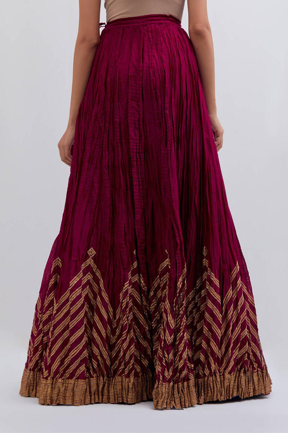 Chanderi 40 kali lehenga edged with dull gold gota embroidery and contrast chanderi facings.