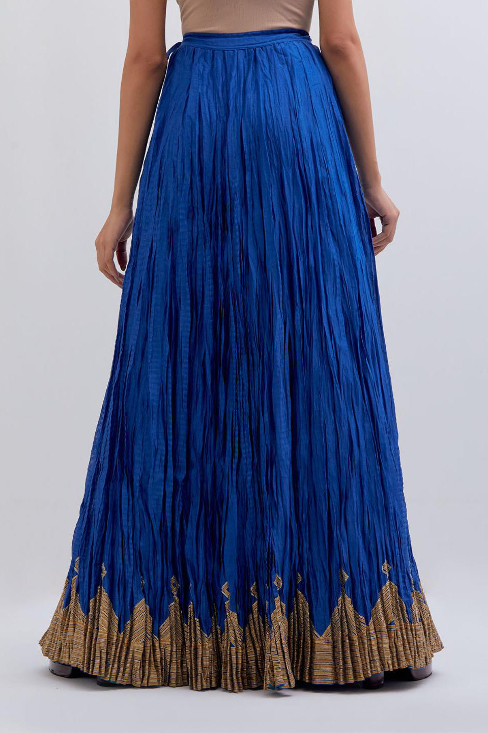 Chanderi 40 kali lehenga edged with dull gold gota embroidery and contrast chanderi facings.