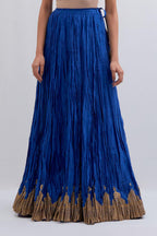 Chanderi 40 kali lehenga edged with dull gold gota embroidery and contrast chanderi facings.