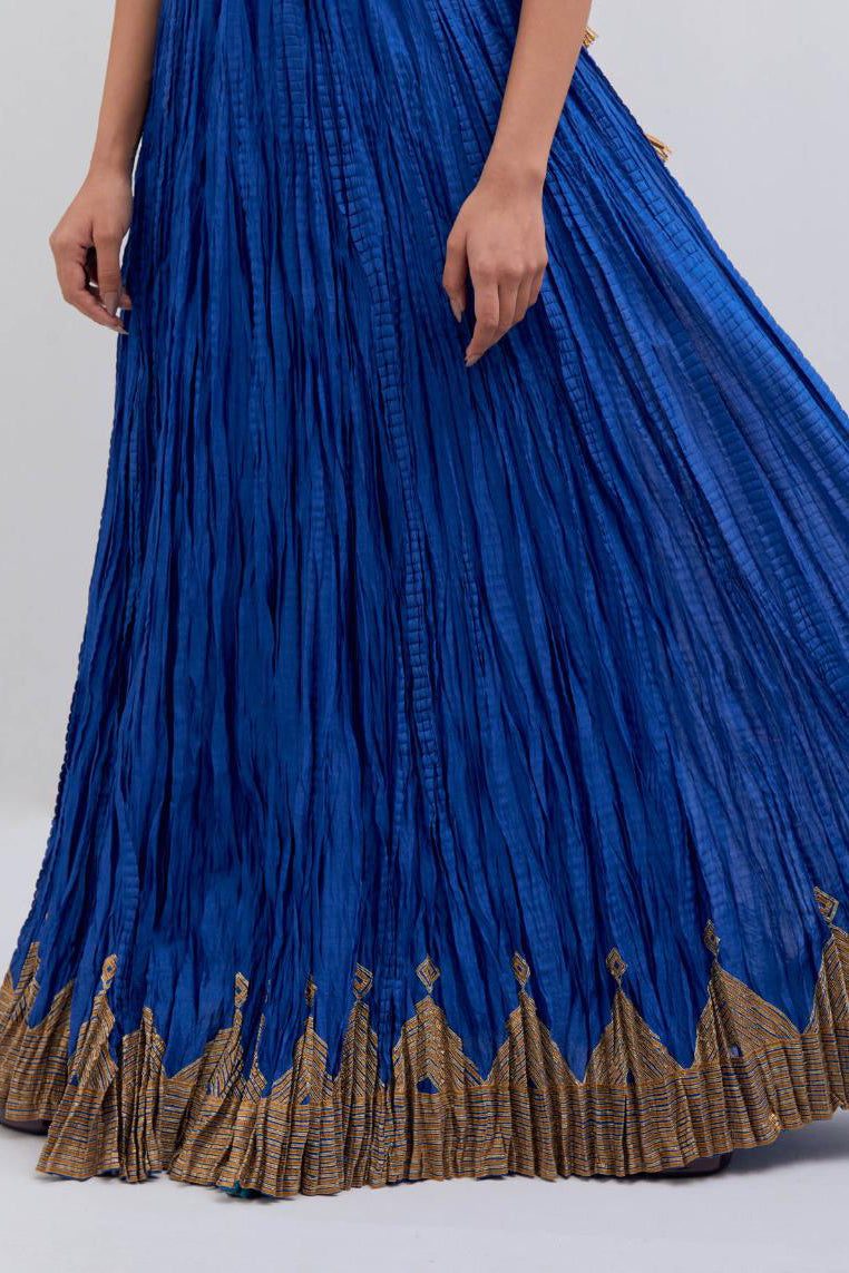 Chanderi 40 kali lehenga edged with dull gold gota embroidery and contrast chanderi facings.