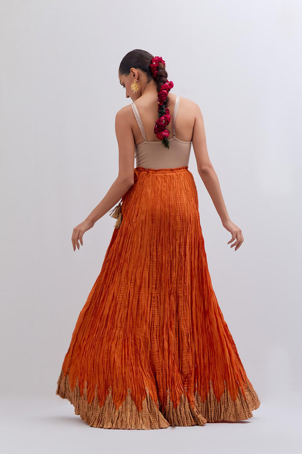 Chanderi 40 kali lehenga edged with dull gold gota embroidery and contrast chanderi facings.