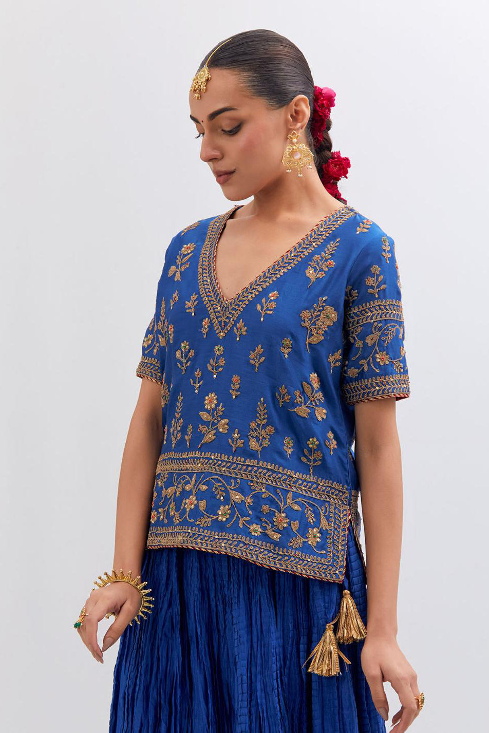 Chelsea Blue Silk Chanderi long choli set with all-over dull gold dori embroidery, highlighted with multi colored beads and gold sequins work.