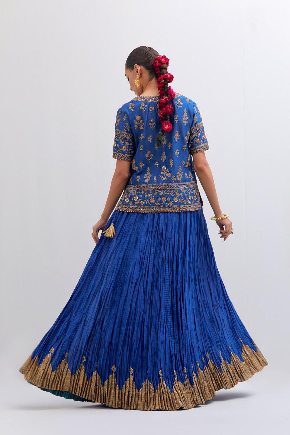 Chelsea Blue Silk Chanderi long choli set with all-over dull gold dori embroidery, highlighted with multi colored beads and gold sequins work.