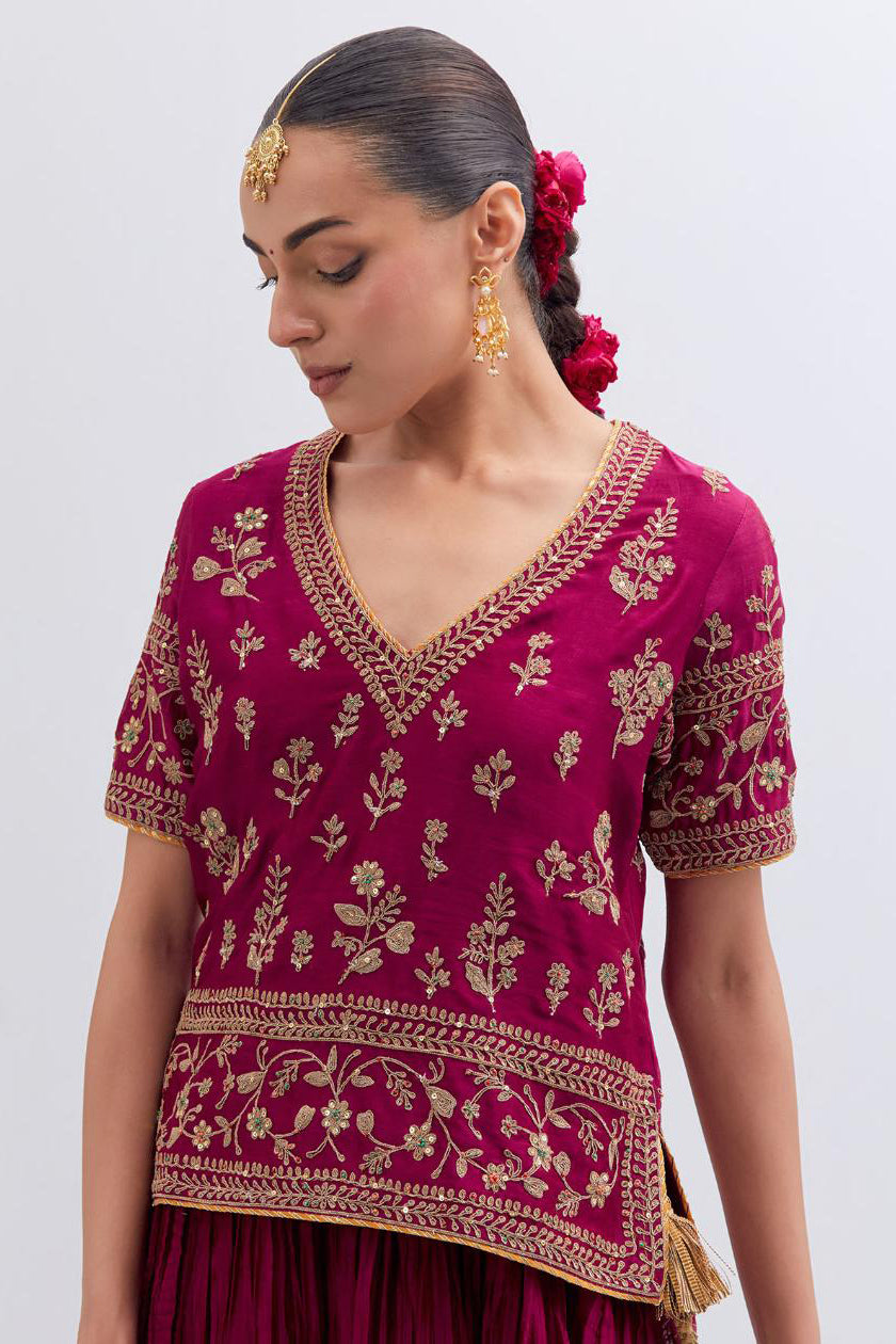 Deep Fuchsia Silk Chanderi long choli set with all-over dull gold dori embroidery, highlighted with multi colored beads and gold sequins work.