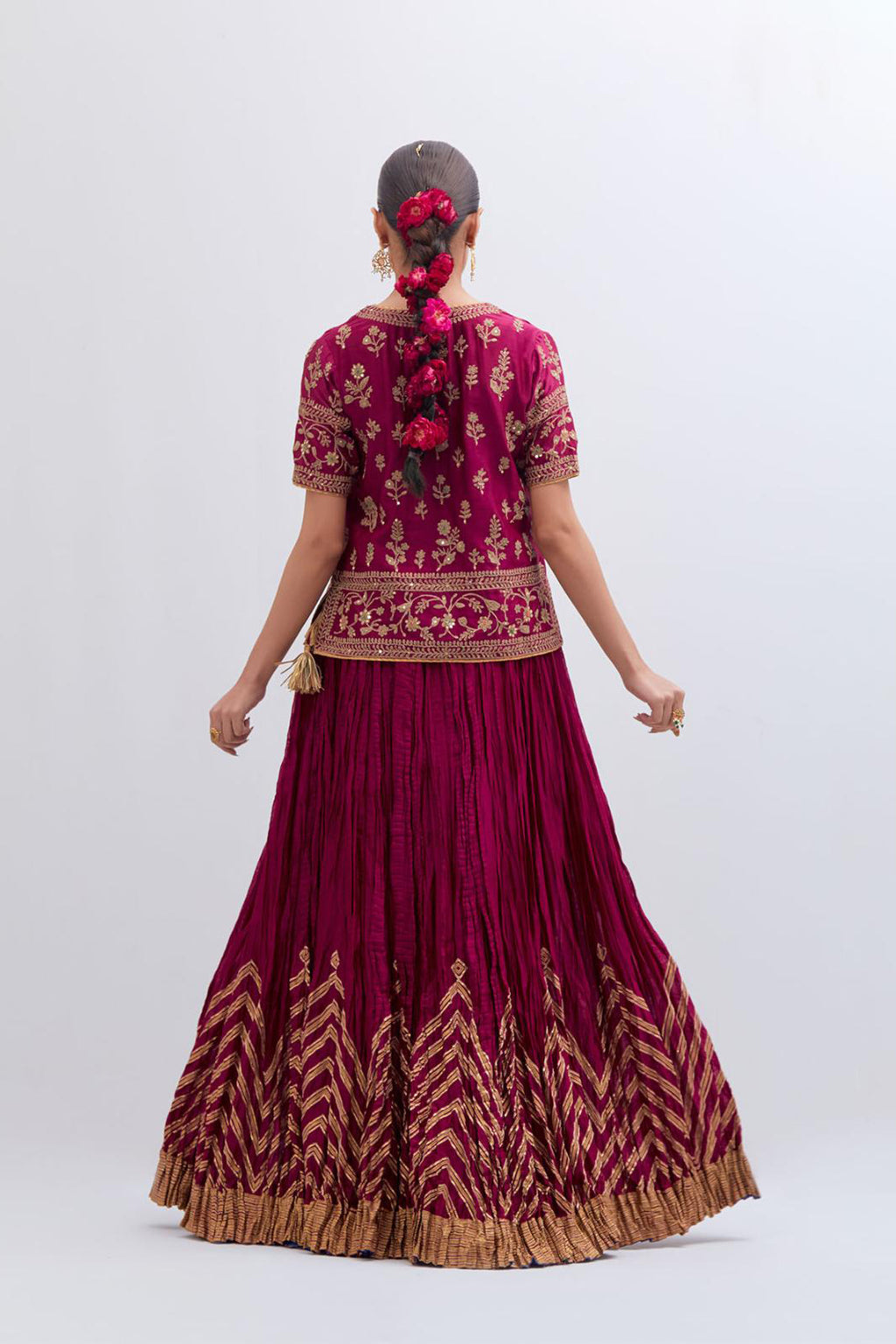 Deep Fuchsia Silk Chanderi long choli set with all-over dull gold dori embroidery, highlighted with multi colored beads and gold sequins work.