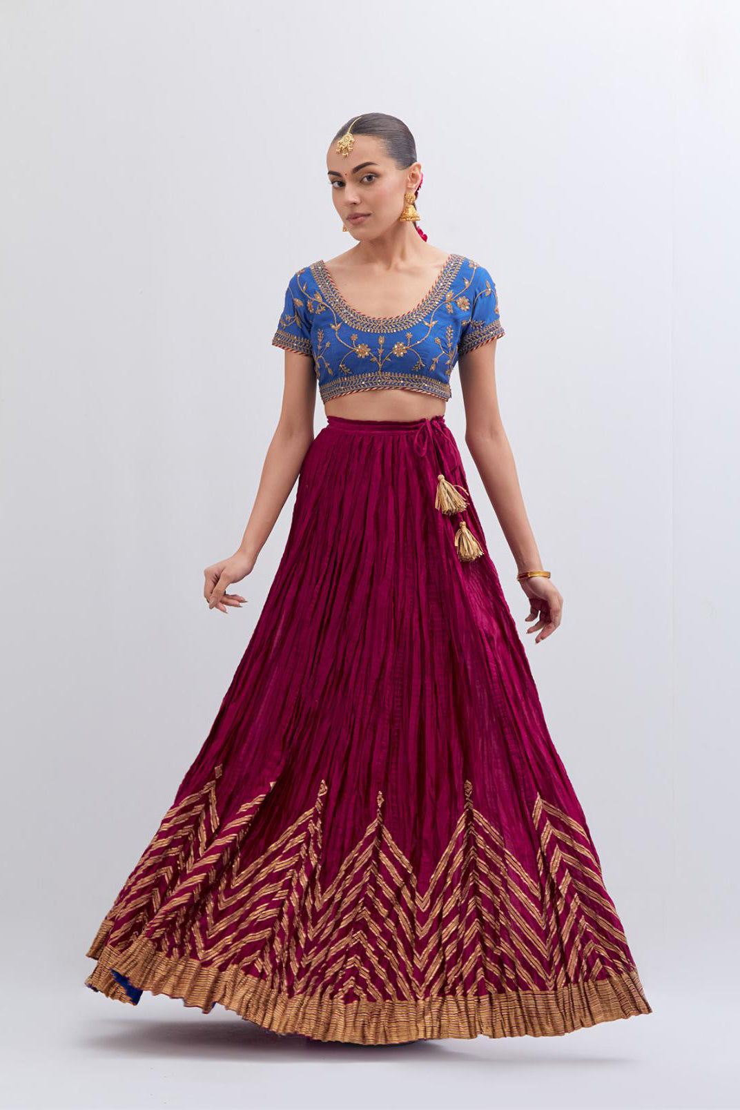 Chelsea Blue Silk Chanderi choli set with all-over dull gold dori embroidery, highlighted with multi colored beads and gold sequins work.