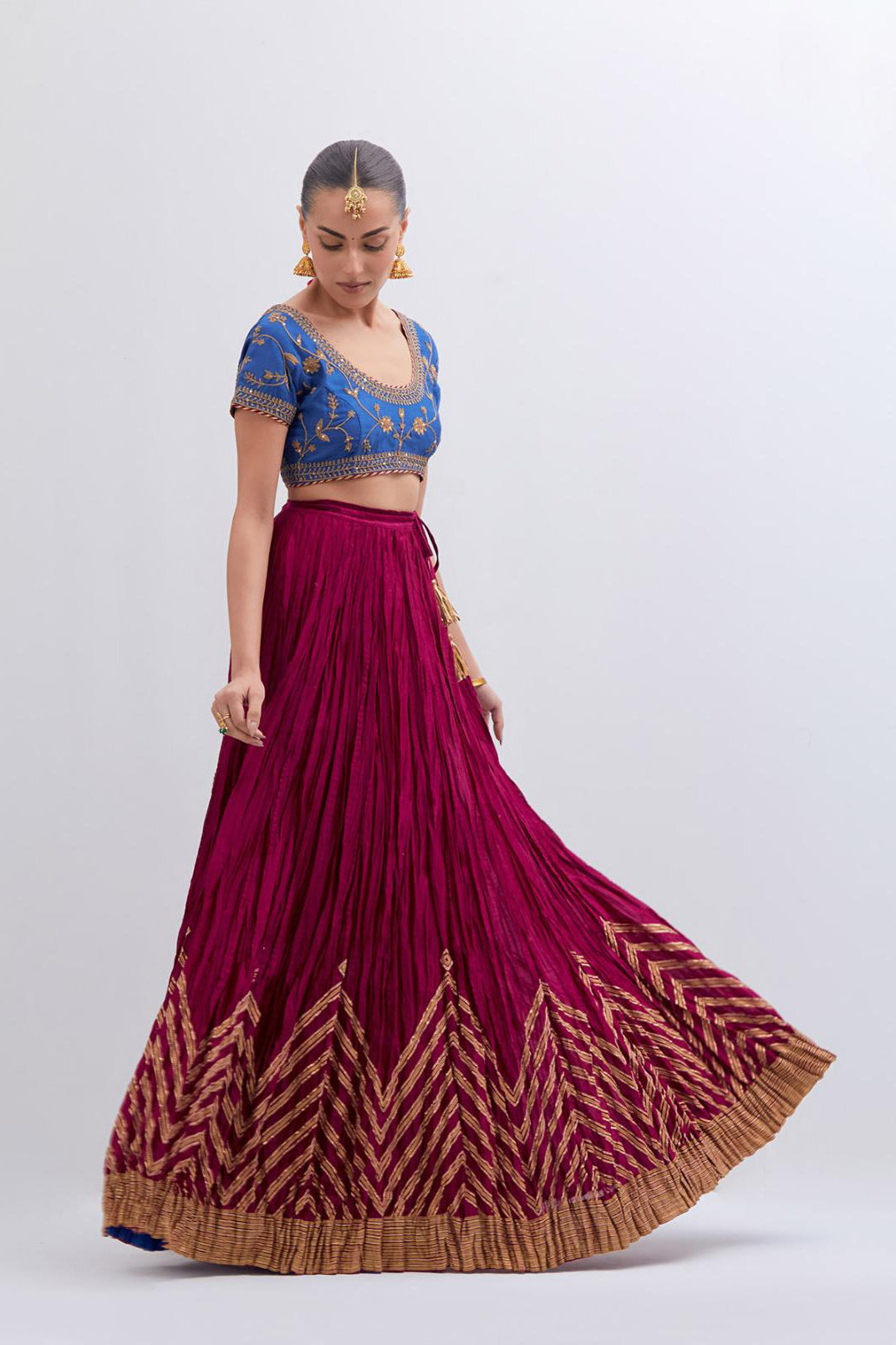 Chelsea Blue Silk Chanderi choli set with all-over dull gold dori embroidery, highlighted with multi colored beads and gold sequins work.
