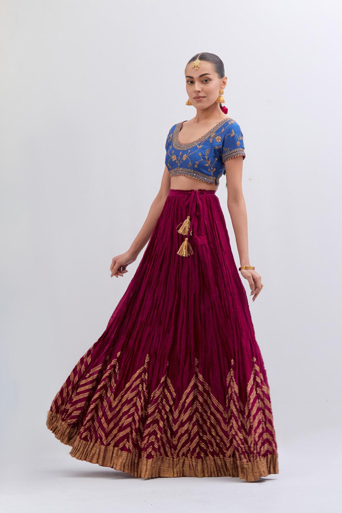 Chelsea Blue Silk Chanderi choli set with all-over dull gold dori embroidery, highlighted with multi colored beads and gold sequins work.