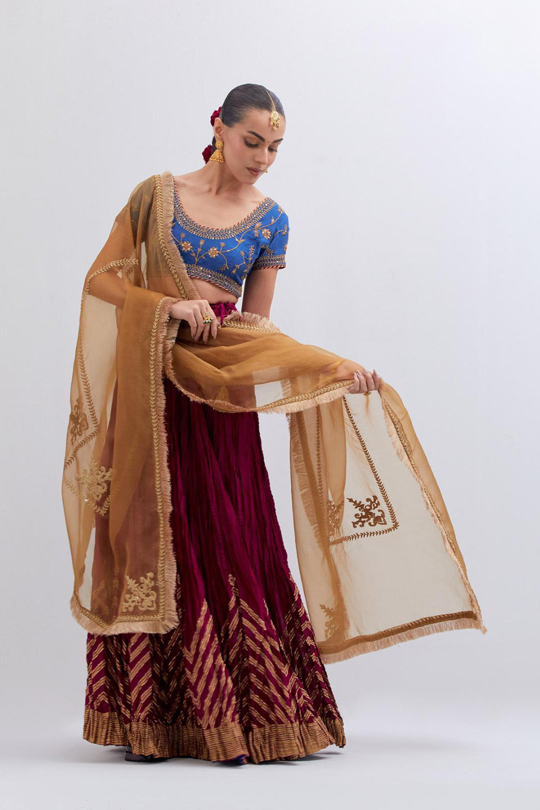 Chelsea Blue Silk Chanderi choli set with all-over dull gold dori embroidery, highlighted with multi colored beads and gold sequins work.
