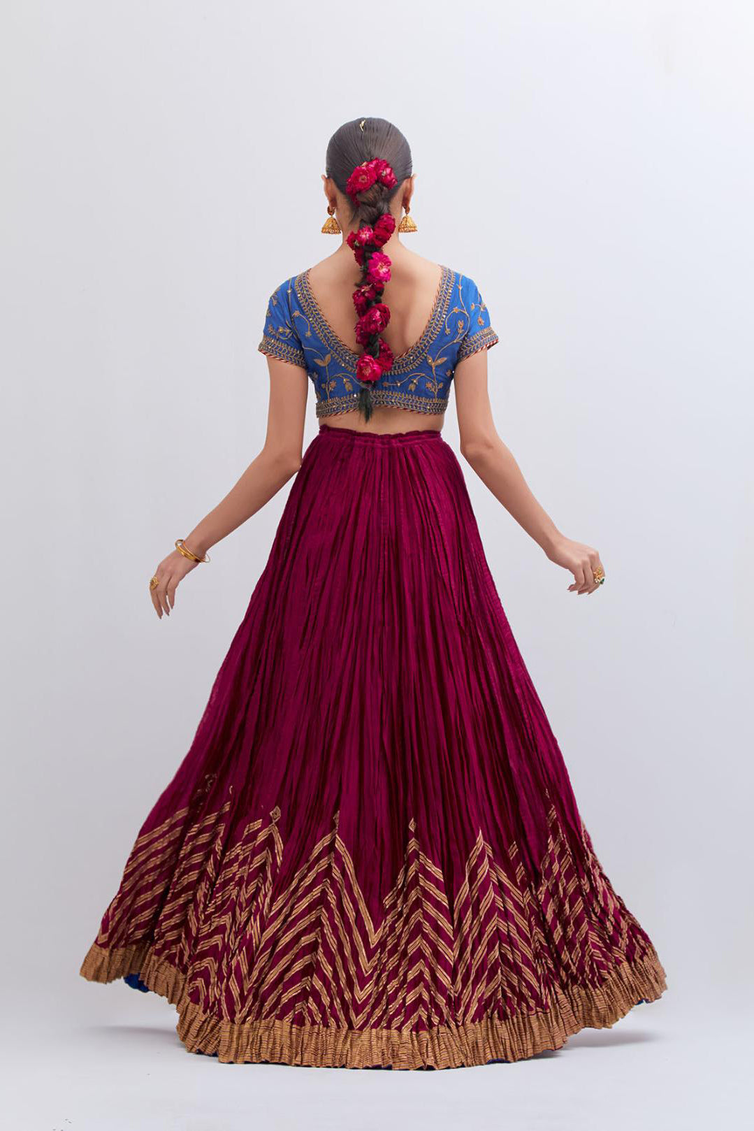 Chelsea Blue Silk Chanderi choli set with all-over dull gold dori embroidery, highlighted with multi colored beads and gold sequins work.