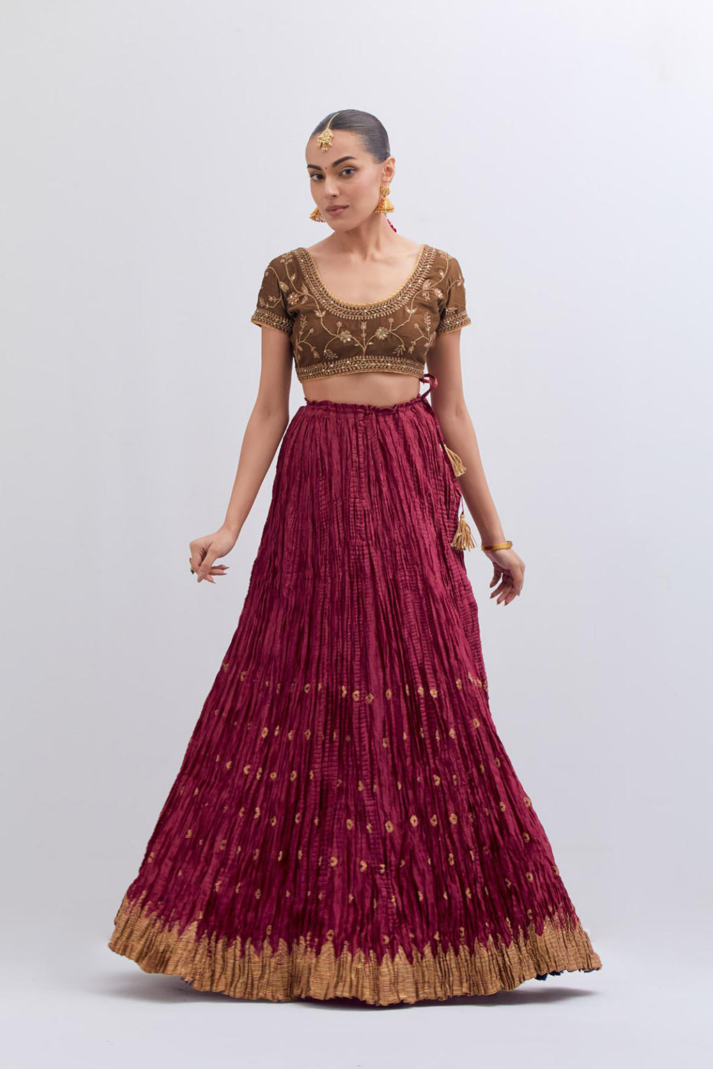 Olive Silk Chanderi choli set with all-over dull gold dori embroidery, highlighted with multi colored beads and gold sequins work.