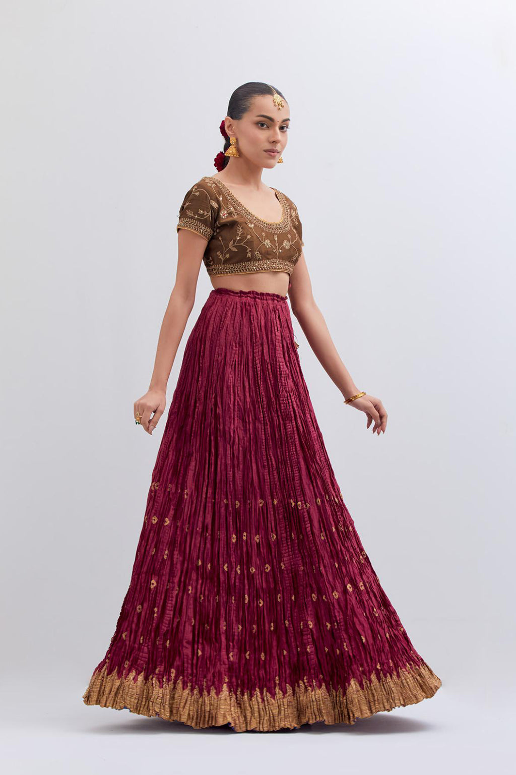 Olive Silk Chanderi choli set with all-over dull gold dori embroidery, highlighted with multi colored beads and gold sequins work.