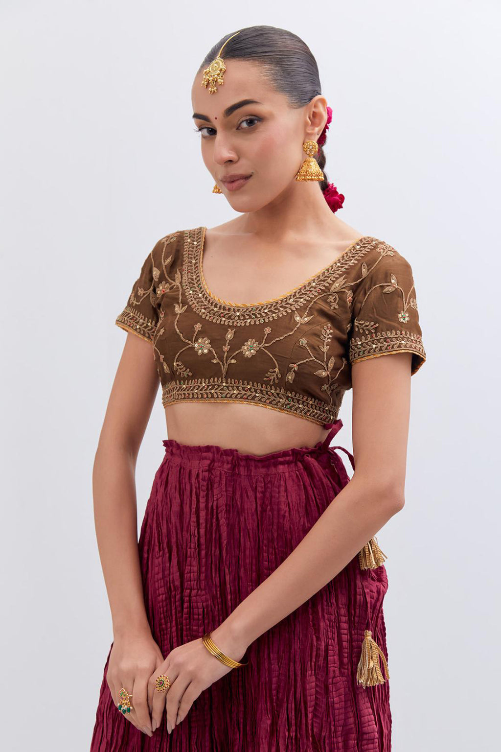 Olive Silk Chanderi choli set with all-over dull gold dori embroidery, highlighted with multi colored beads and gold sequins work.
