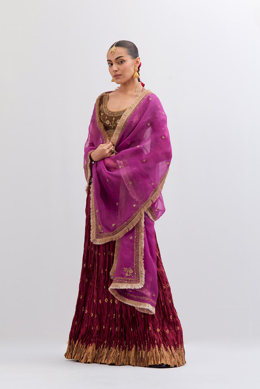 Olive Silk Chanderi choli set with all-over dull gold dori embroidery, highlighted with multi colored beads and gold sequins work.
