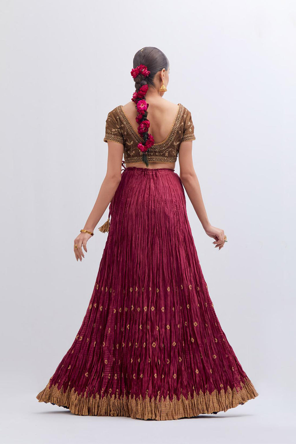 Olive Silk Chanderi choli set with all-over dull gold dori embroidery, highlighted with multi colored beads and gold sequins work.