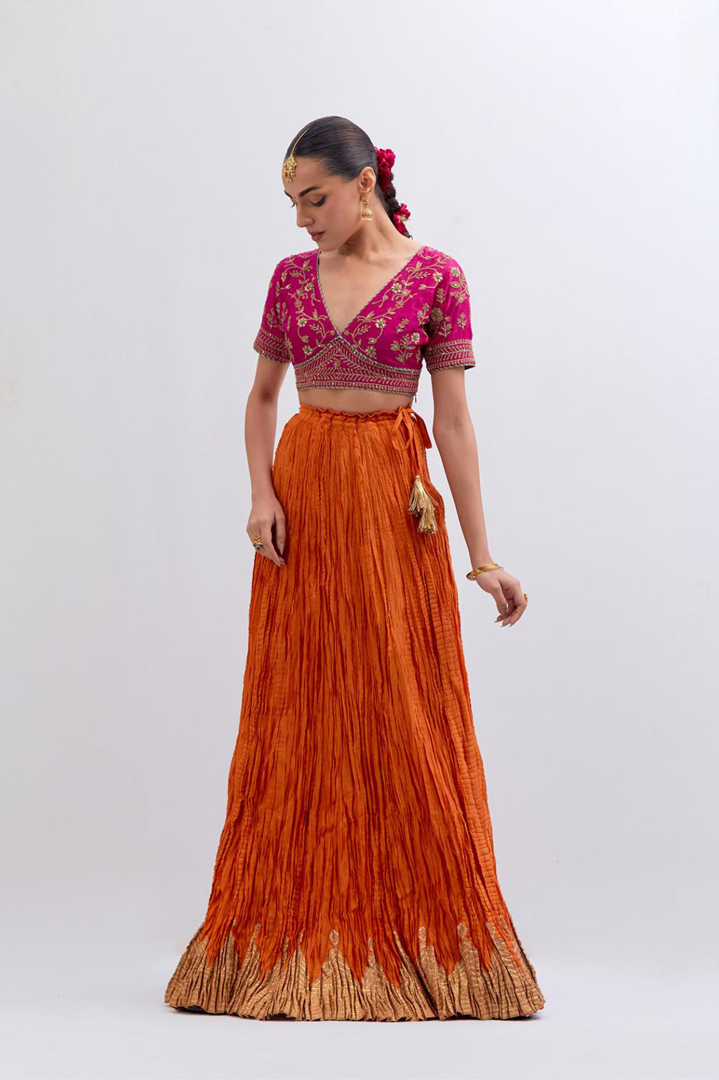Fuchsia Silk Chanderi Choli set with all-over dull gold dori embroidery, highlighted with multi colored beads and gold sequins work.