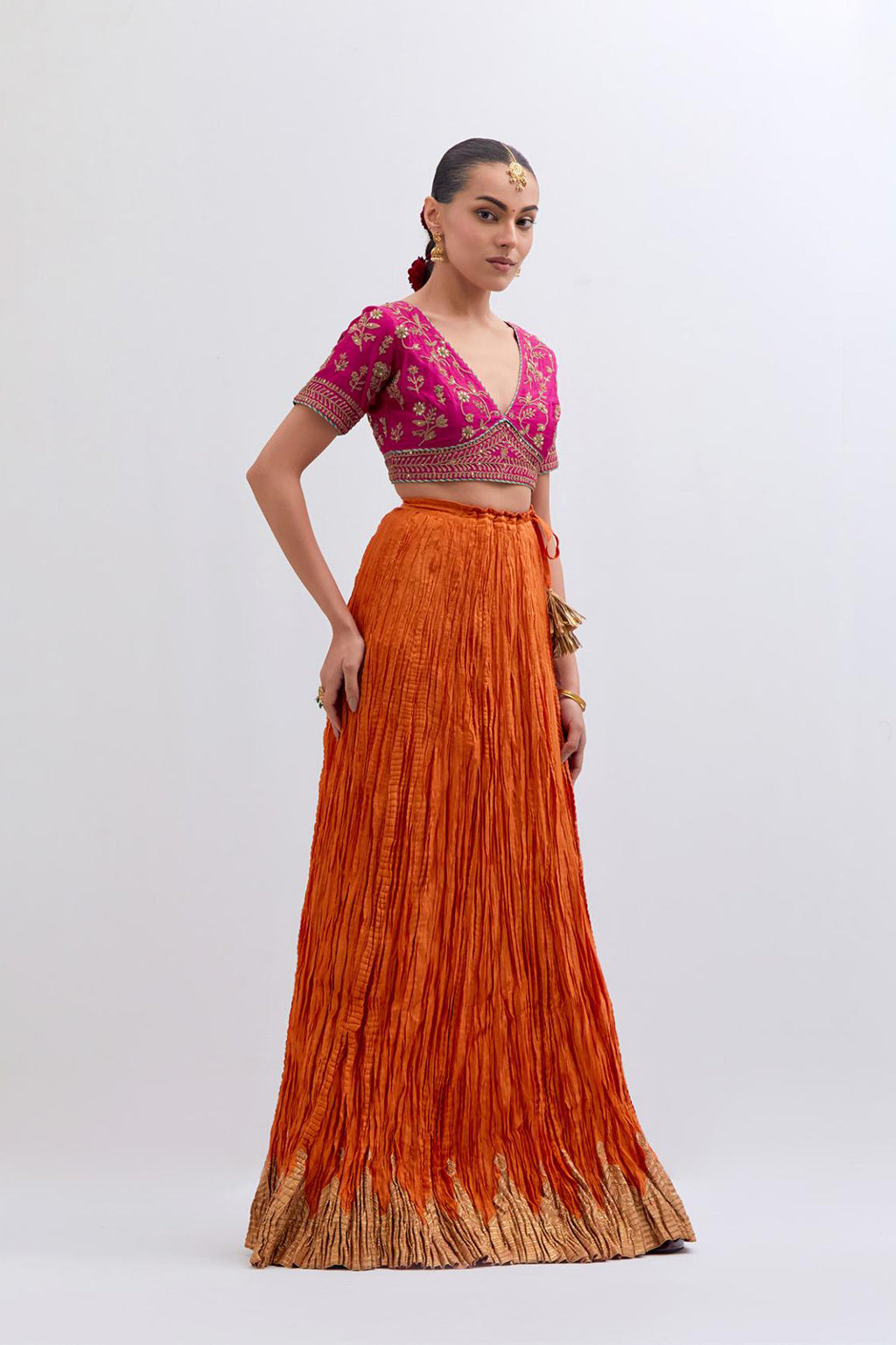 Fuchsia Silk Chanderi Choli set with all-over dull gold dori embroidery, highlighted with multi colored beads and gold sequins work.