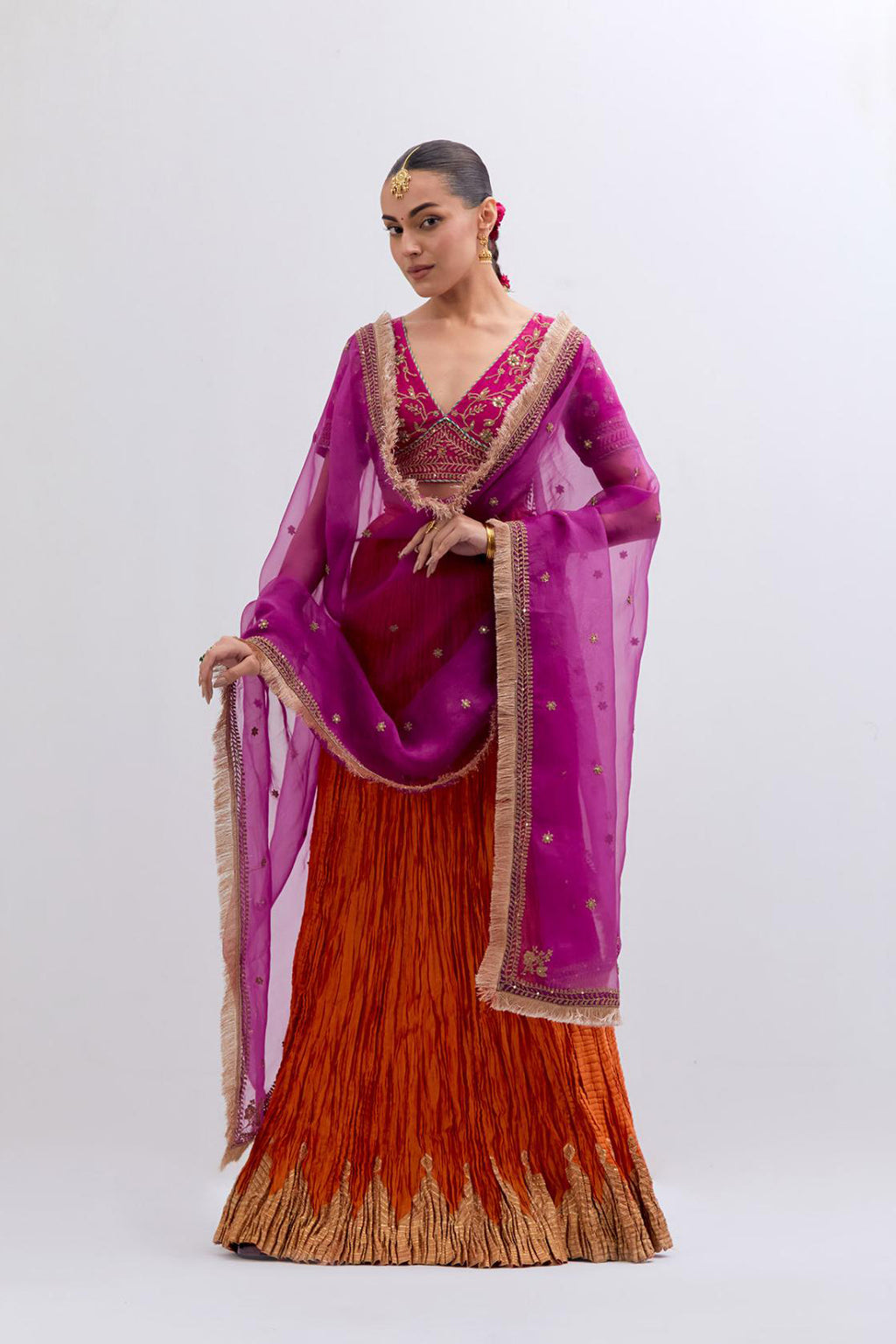 Fuchsia Silk Chanderi Choli set with all-over dull gold dori embroidery, highlighted with multi colored beads and gold sequins work.