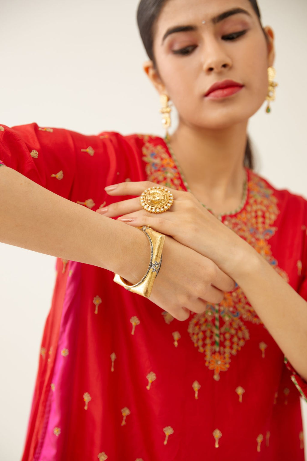 Red & fuchsia silk kalidar kurta set with all over dori & silk thread embroidery, highlighted with contrast bead & sequins work.