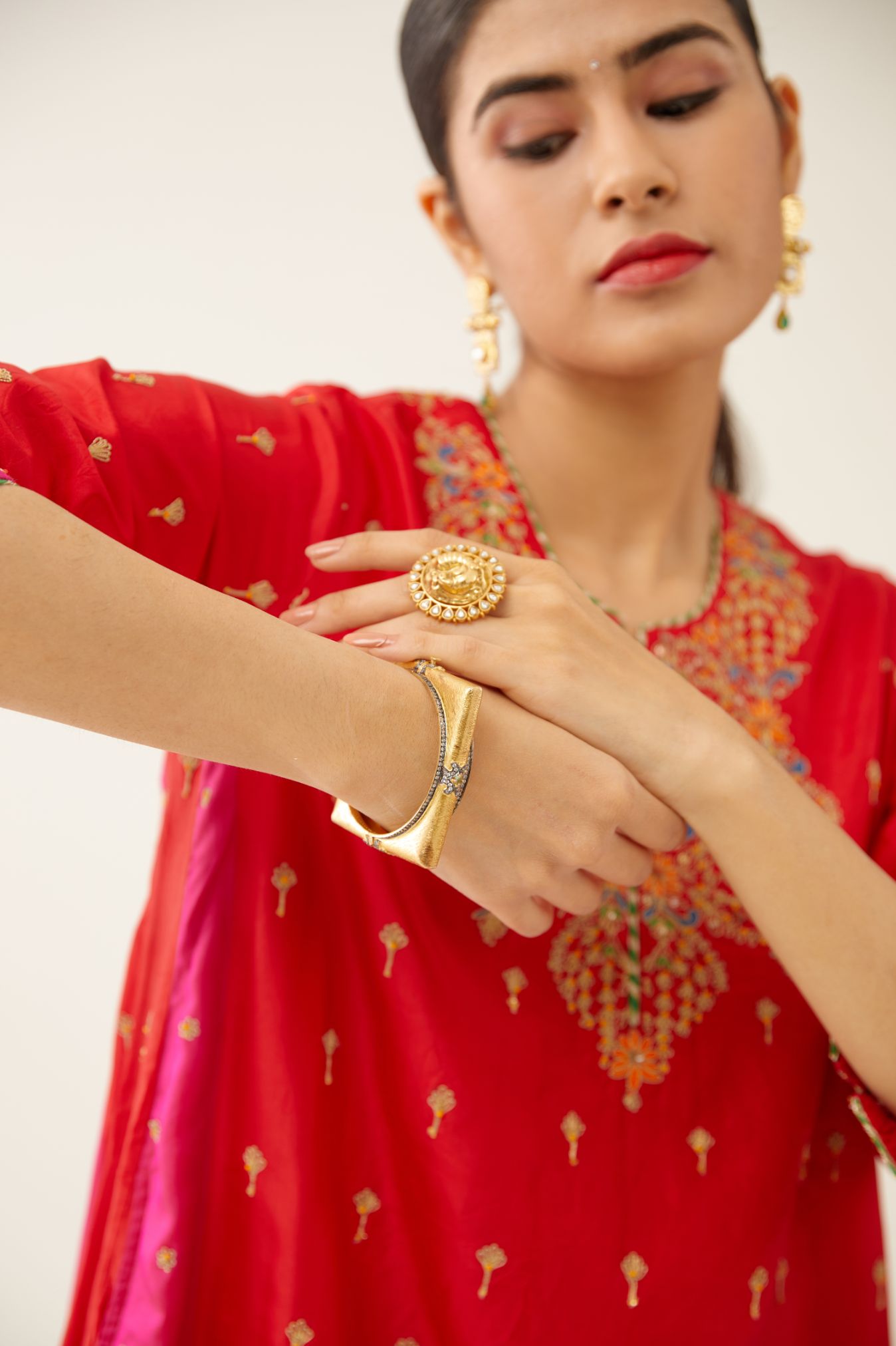 Red & fuchsia silk kalidar kurta set with all over dori & silk thread embroidery, highlighted with contrast bead & sequins work.