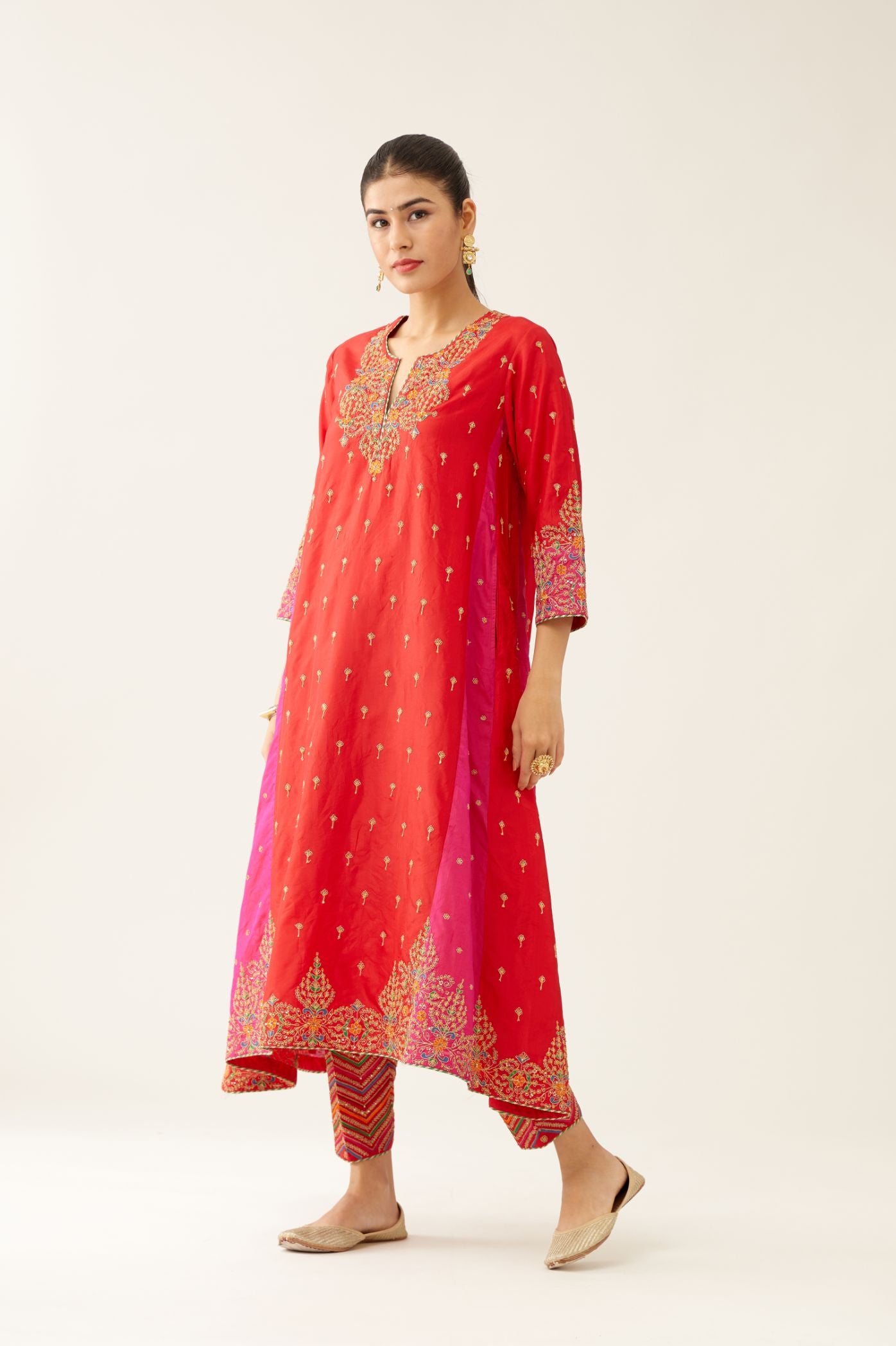 Red & fuchsia silk kalidar kurta set with all over dori & silk thread embroidery, highlighted with contrast bead & sequins work.