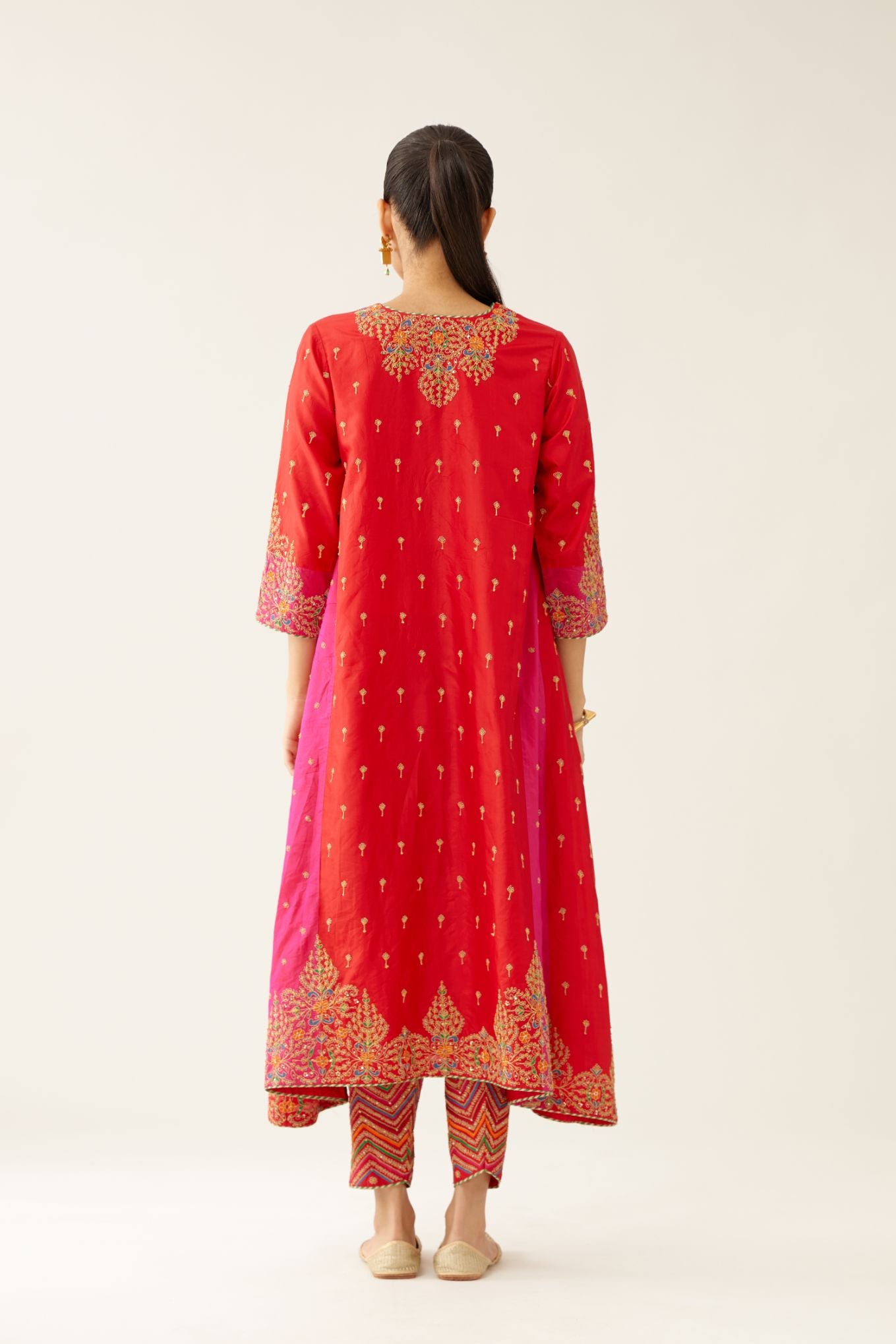 Red & fuchsia silk kalidar kurta set with all over dori & silk thread embroidery, highlighted with contrast bead & sequins work.