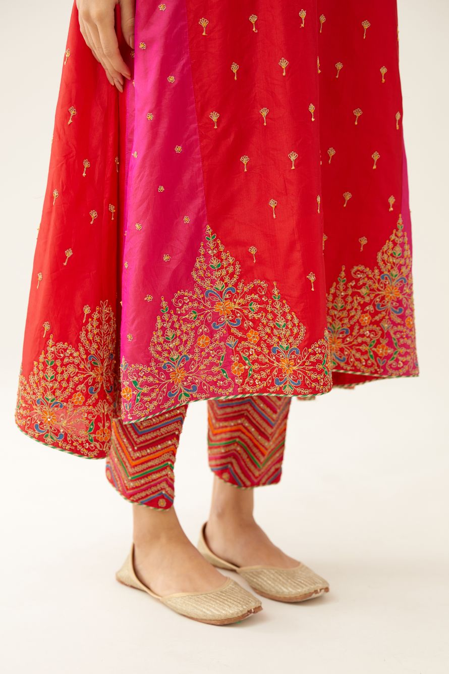 Red & fuchsia silk kalidar kurta set with all over dori & silk thread embroidery, highlighted with contrast bead & sequins work.