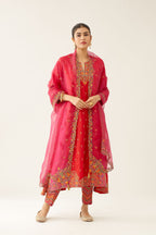 Red & fuchsia silk kalidar kurta set with all over dori & silk thread embroidery, highlighted with contrast bead & sequins work.