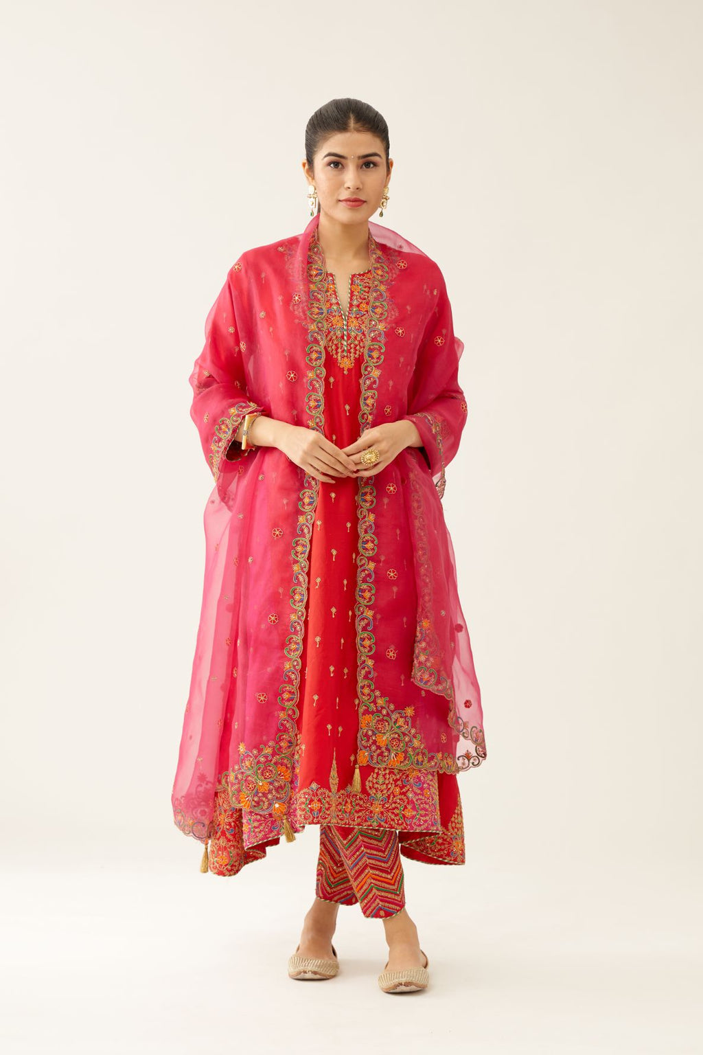 Red & fuchsia silk kalidar kurta set with all over dori & silk thread embroidery, highlighted with contrast bead & sequins work.