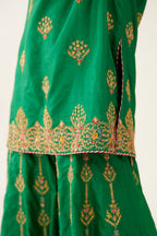 Green silk short kurta set, with dori & silk thread embroidery highlighted with contrast bead & sequins work.