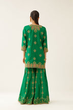 Green silk short kurta set, with dori & silk thread embroidery highlighted with contrast bead & sequins work.
