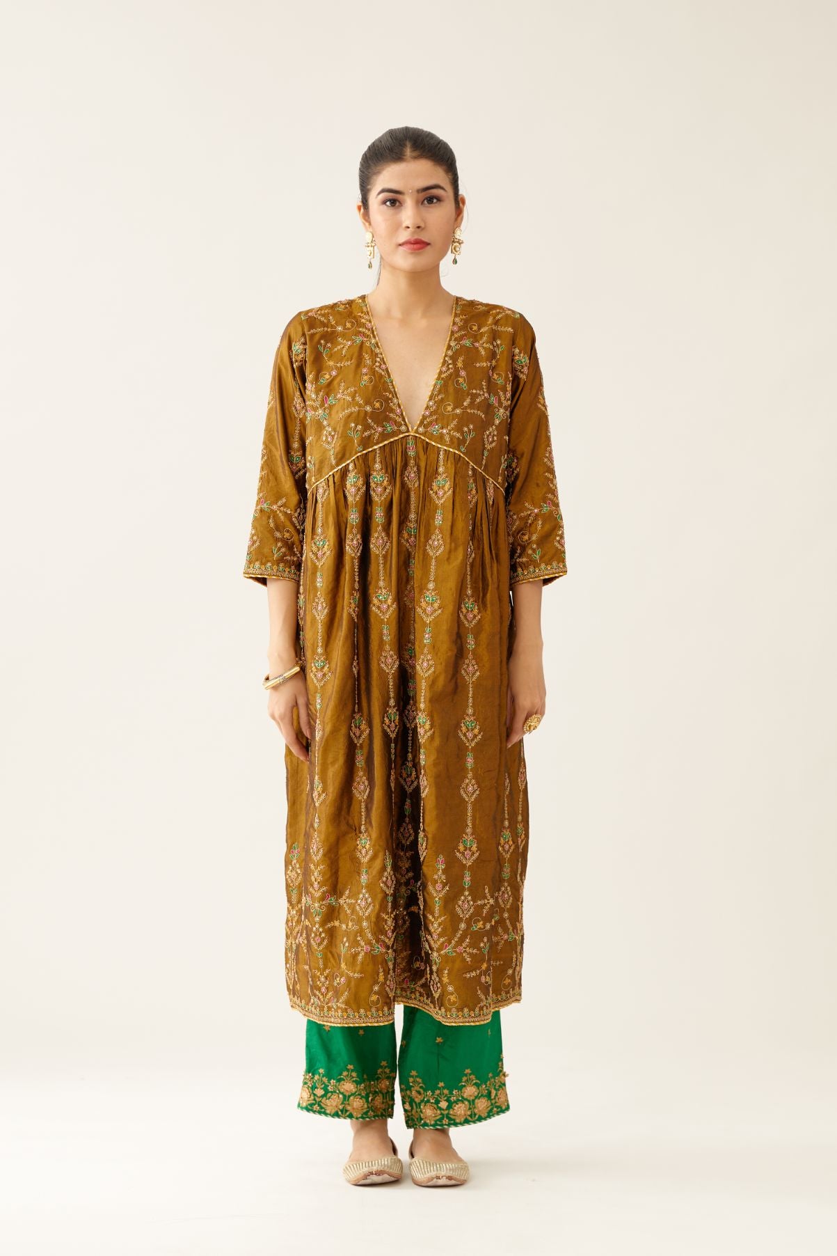 Golden olive silk embroidered kurta dress set with fine gathers at empire line.