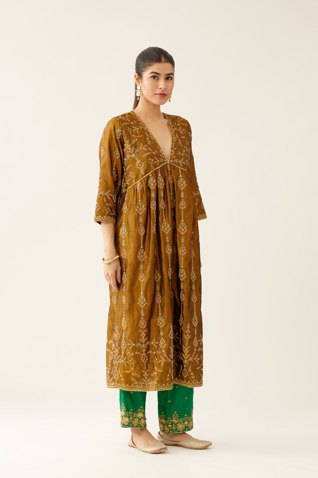 Golden olive silk embroidered kurta dress set with fine gathers at empire line.