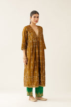 Golden olive silk embroidered kurta dress set with fine gathers at empire line.