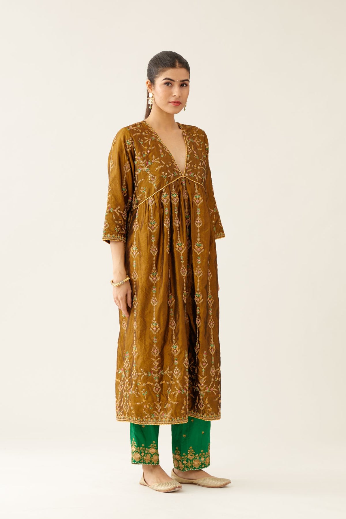 Golden olive silk embroidered kurta dress set with fine gathers at empire line.