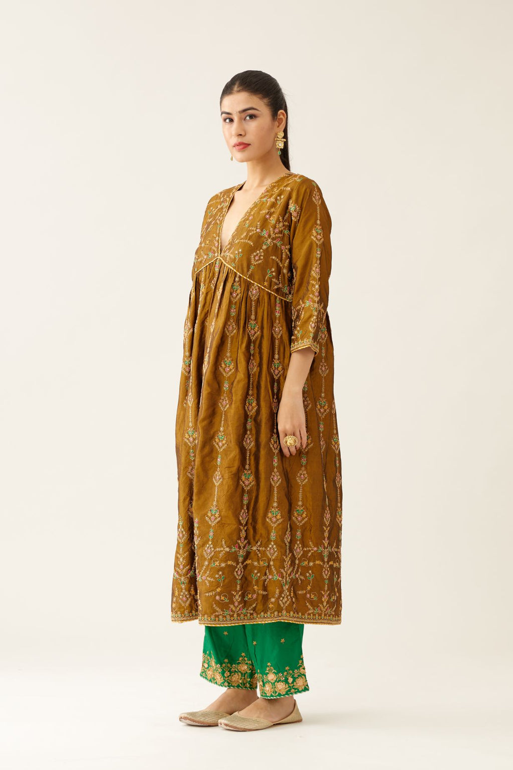 Golden olive silk embroidered kurta dress set with fine gathers at empire line.