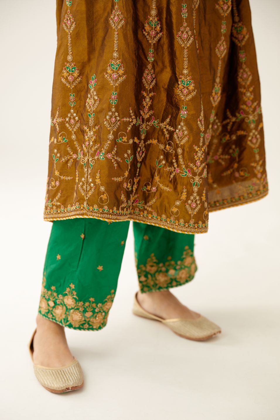 Golden olive silk embroidered kurta dress set with fine gathers at empire line.