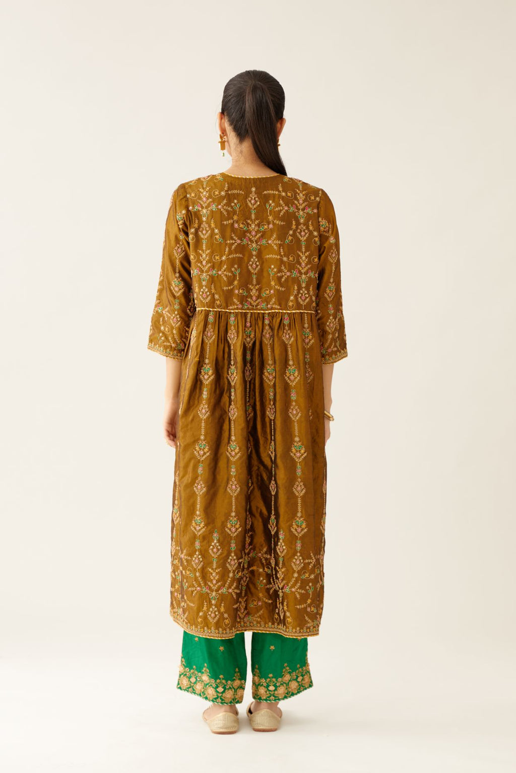 Golden olive silk embroidered kurta dress set with fine gathers at empire line.