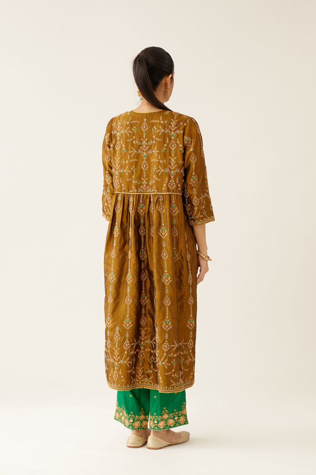 Golden olive silk embroidered kurta dress set with fine gathers at empire line.