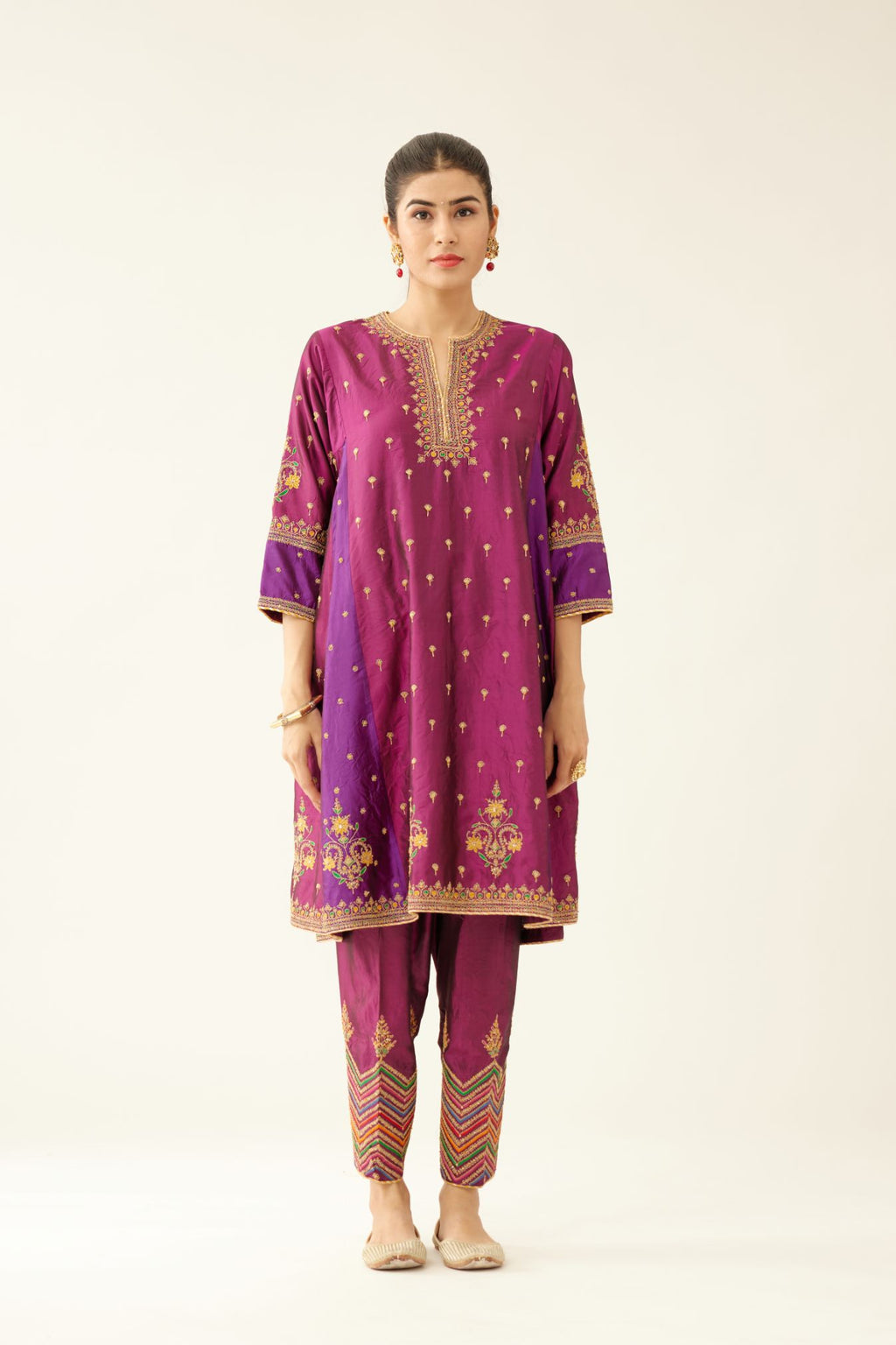 Sangria & plum purple silk short kalidar kurta set with all over dori & silk thread embroidery, highlighted with contrast bead & sequins work.