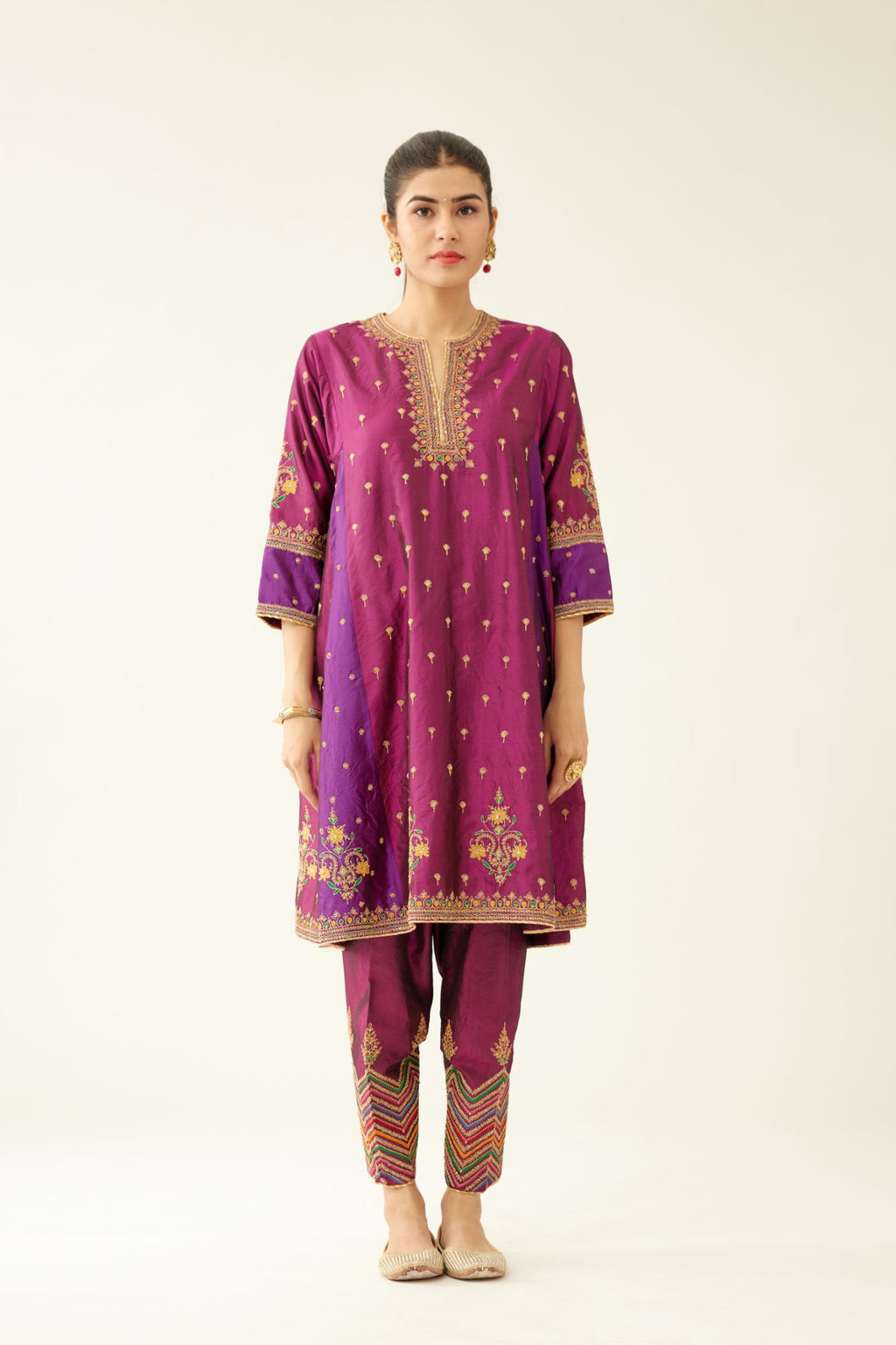 Sangria & plum purple silk short kalidar kurta set with all over dori & silk thread embroidery, highlighted with contrast bead & sequins work.