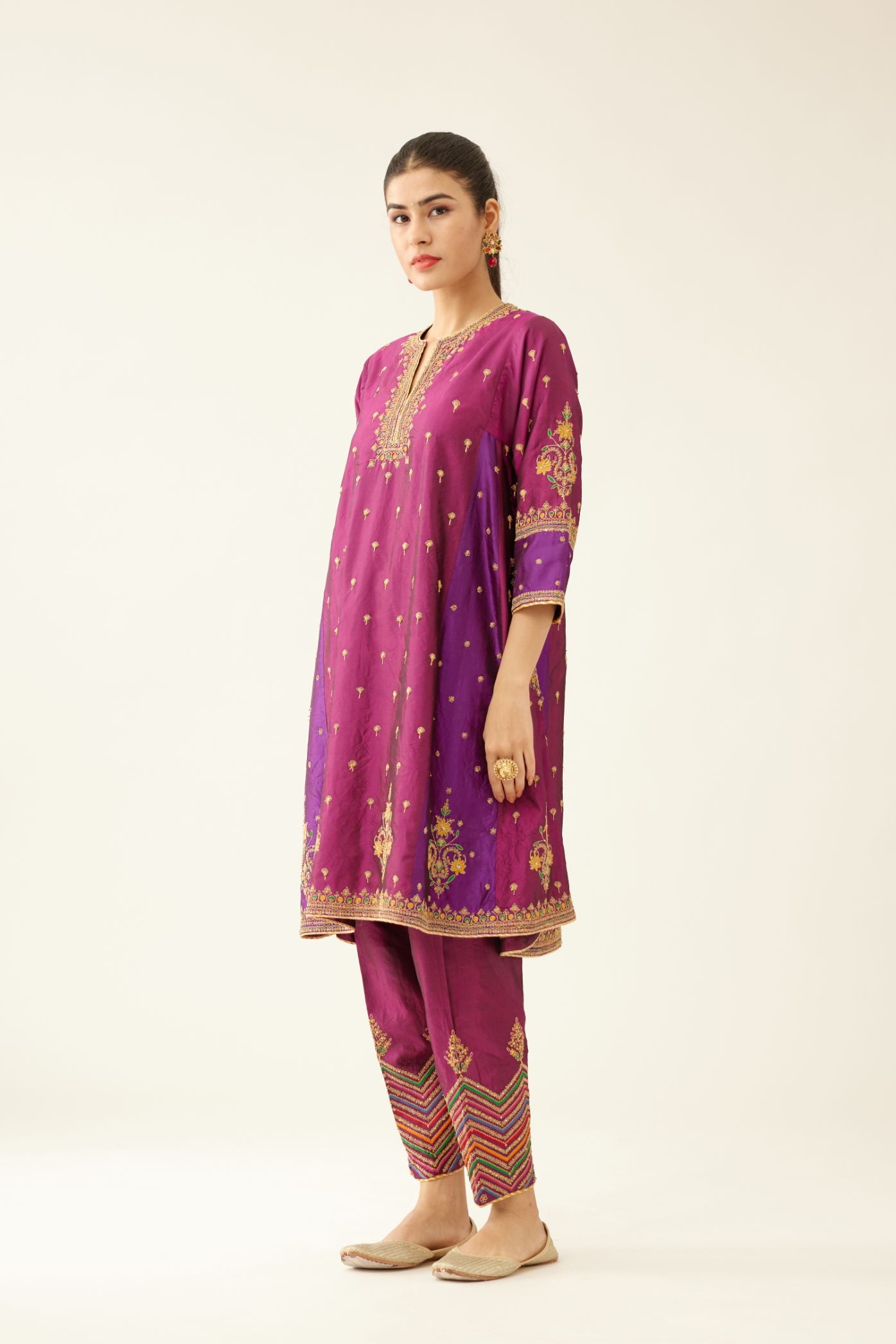 Sangria & plum purple silk short kalidar kurta set with all over dori & silk thread embroidery, highlighted with contrast bead & sequins work.