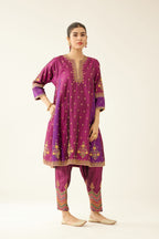 Sangria & plum purple silk short kalidar kurta set with all over dori & silk thread embroidery, highlighted with contrast bead & sequins work.