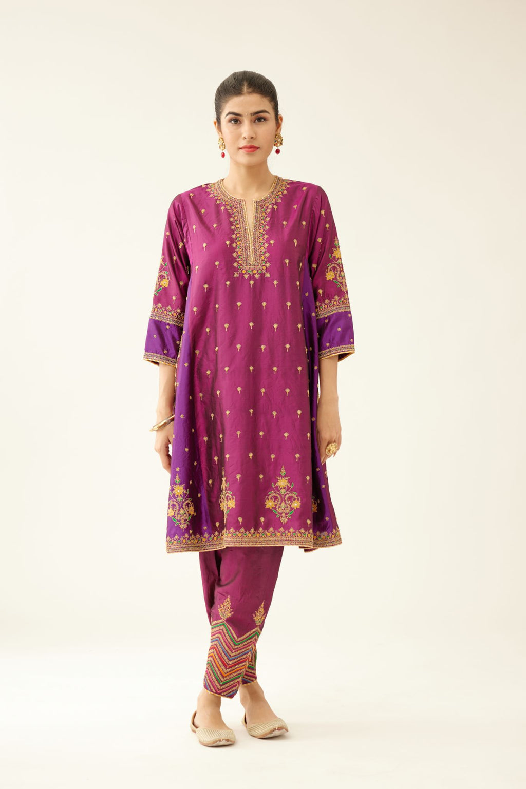 Sangria & plum purple silk short kalidar kurta set with all over dori & silk thread embroidery, highlighted with contrast bead & sequins work.