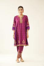 Sangria & plum purple silk short kalidar kurta set with all over dori & silk thread embroidery, highlighted with contrast bead & sequins work.