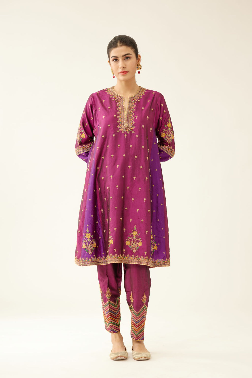 Sangria & plum purple silk short kalidar kurta set with all over dori & silk thread embroidery, highlighted with contrast bead & sequins work.