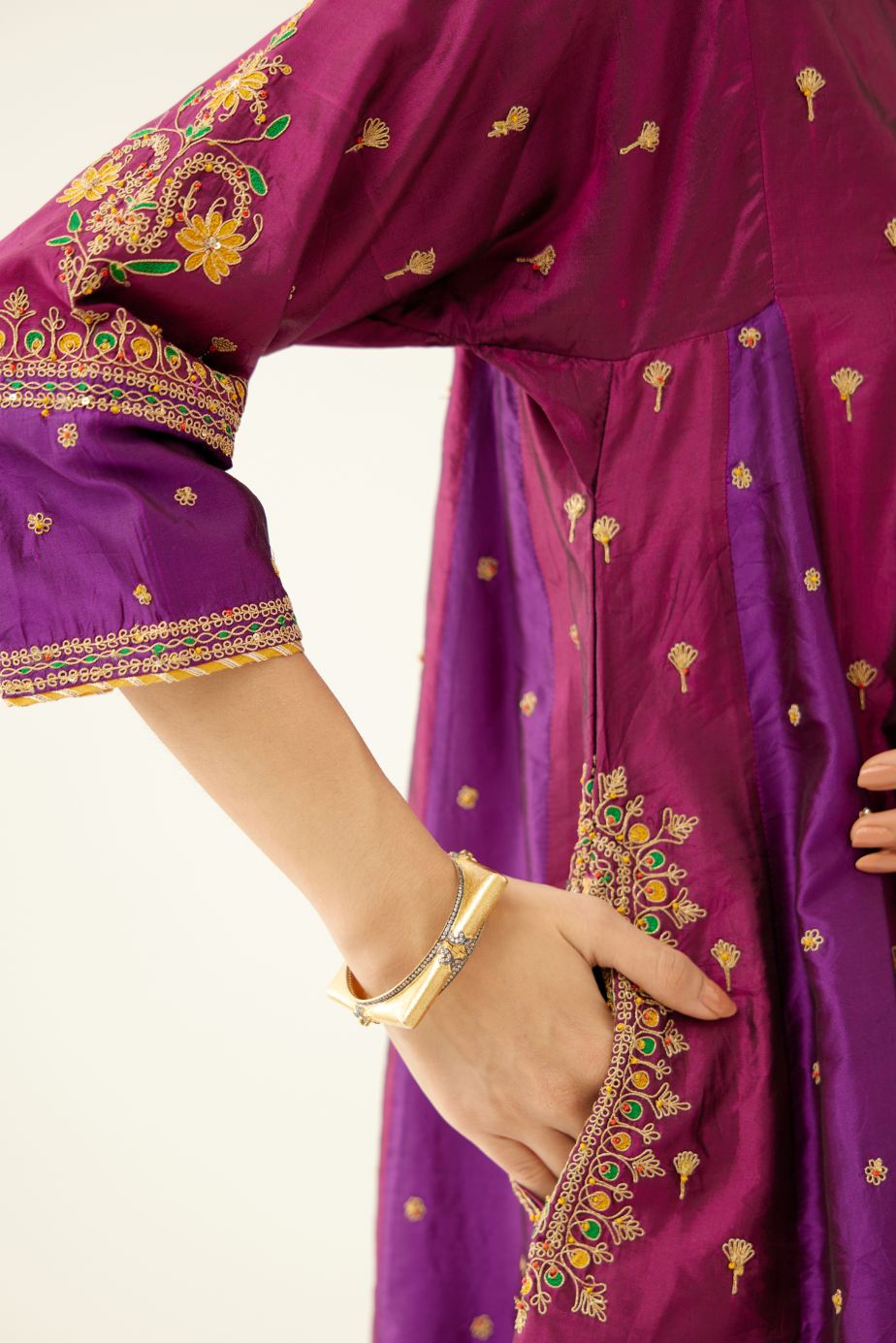 Sangria & plum purple silk short kalidar kurta set with all over dori & silk thread embroidery, highlighted with contrast bead & sequins work.