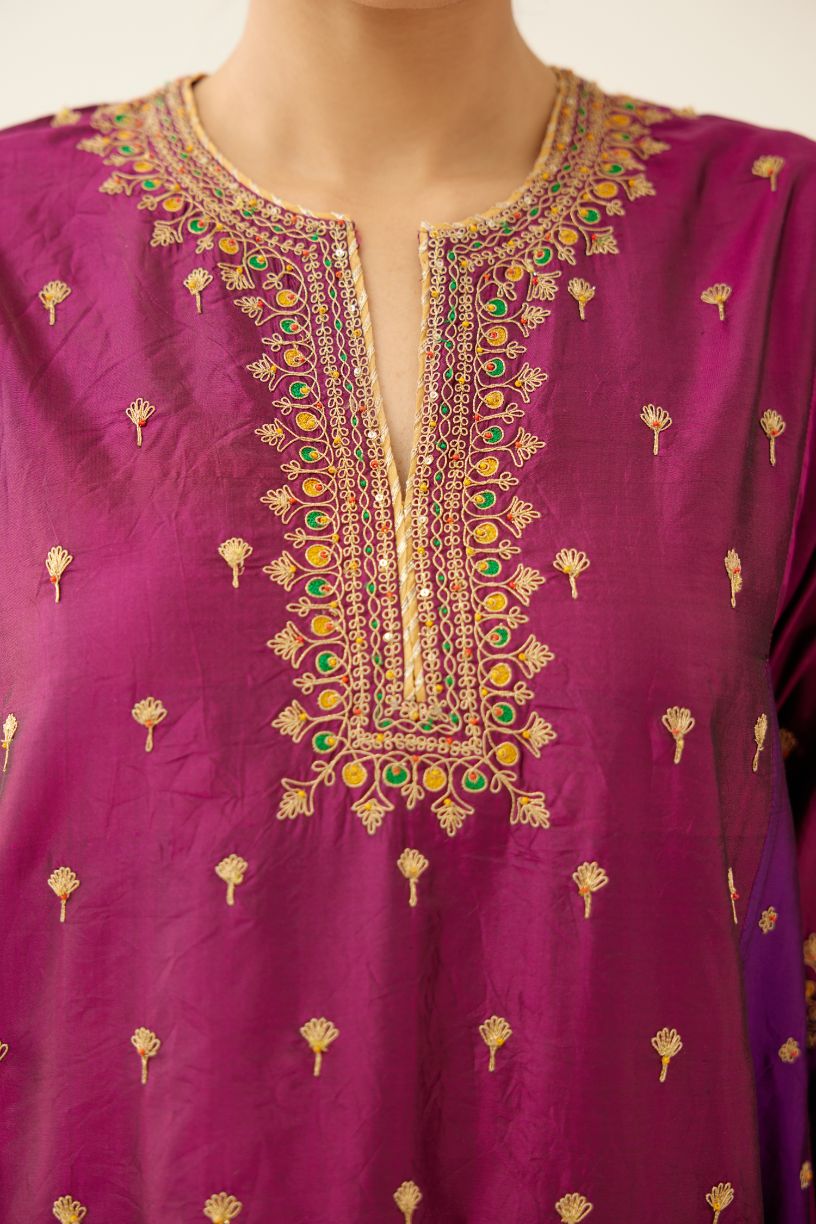 Sangria & plum purple silk short kalidar kurta set with all over dori & silk thread embroidery, highlighted with contrast bead & sequins work.